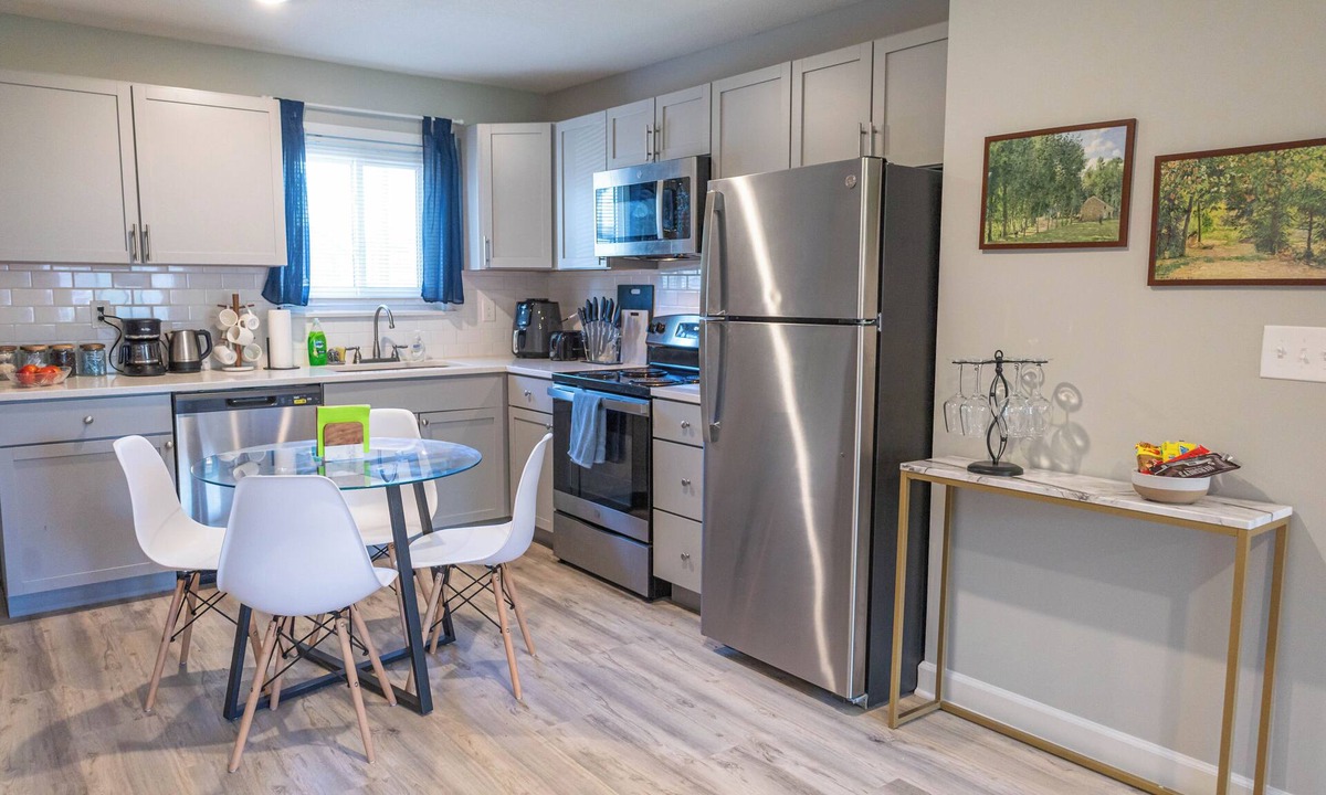 Shawnee Apartment | A charming bedroom with a king bed in quiet Shawnee neighborhood near highways.