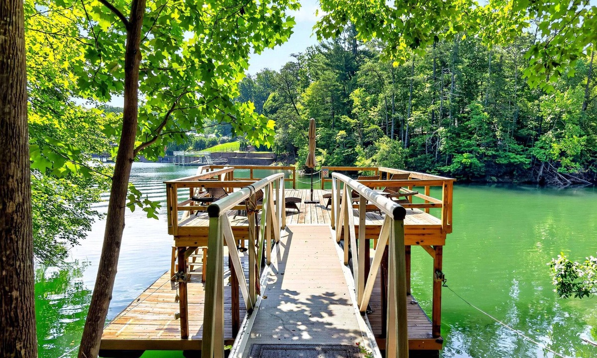 Forest Lake Heights House | Calm Water Cove | Private Dock on Lake James, Game Room, Fire Pit & Spa Suite — Dogs Welcome!