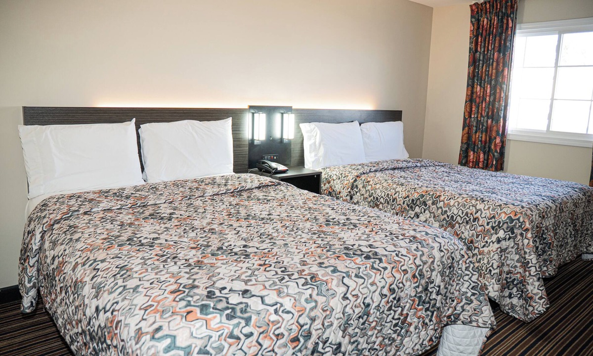 Howell Hotel | Capri inn and Suites
