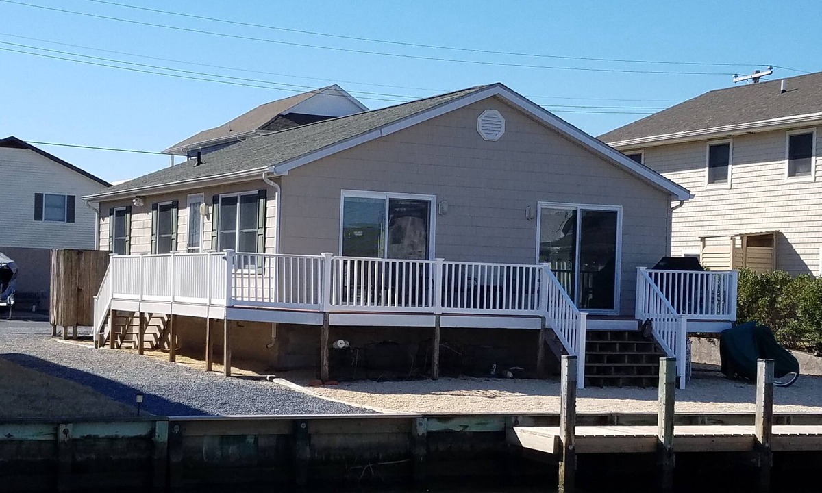 Edgewater Acres House | Charming canal front home, quiet neighborhood, one mile from ocean, Prof. Clean.