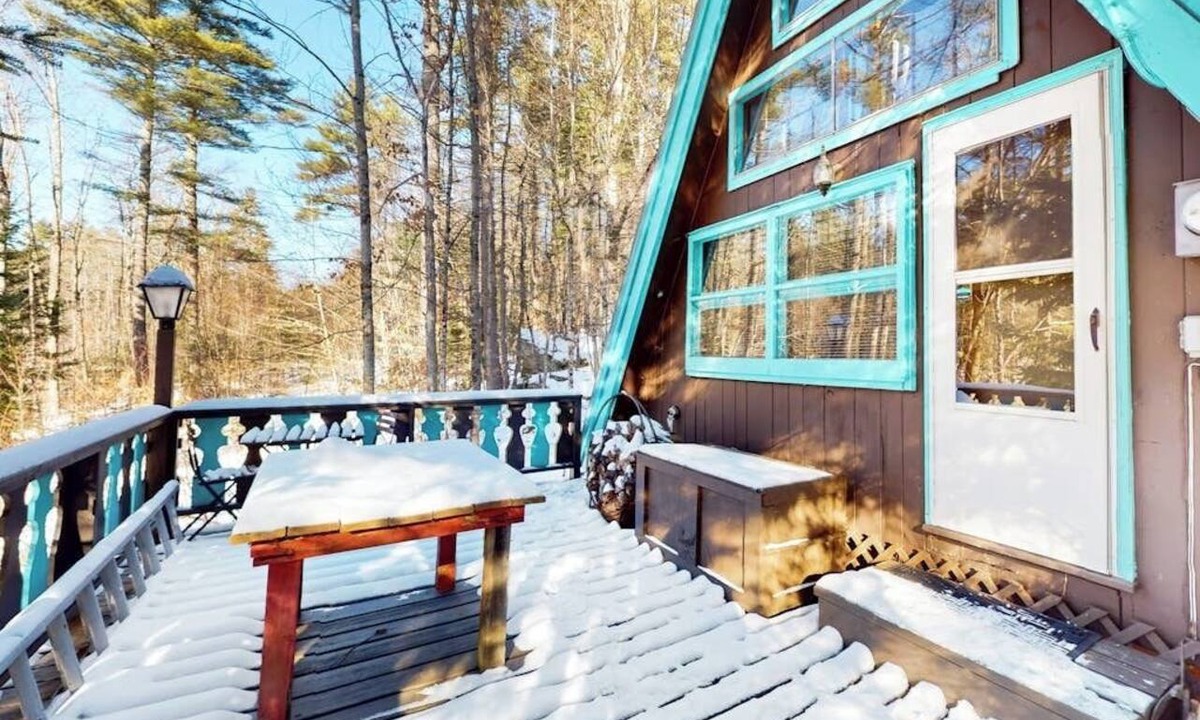 West Townshend House | Charming gingerbread A-frame situated on 3 acres, woodstove, A/C, deck