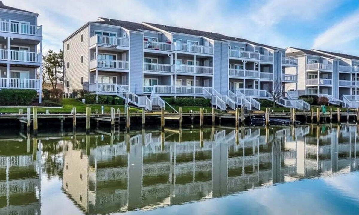 North Ocean City Condo | Hidden Harbor - canal front 1st floor condo with balcony, shared pool, next to Northside Park.