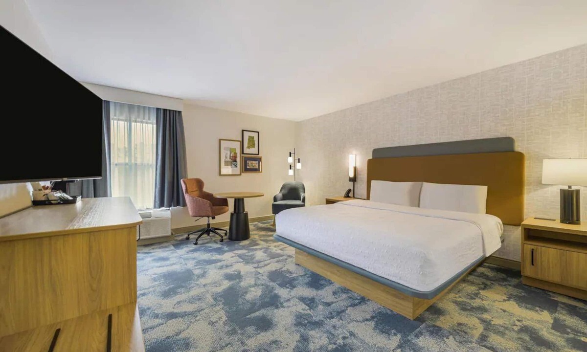 Huntsville Hotel | Inviting Room Great for Families & Groups w/Seasonal Pool, Free Parking & Bfast