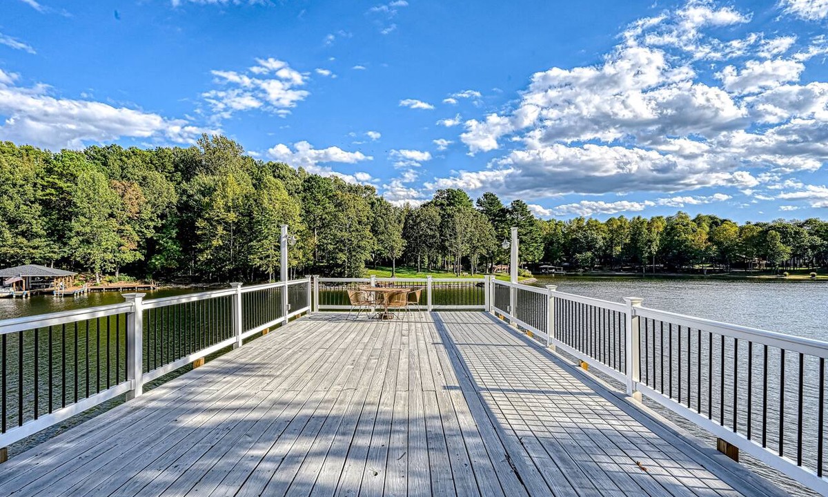 Bumpass House | Lakefront family home in gated community with swimming area & dock - dogs OK