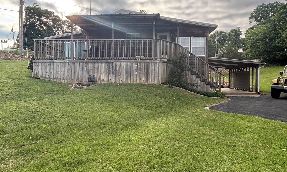 Cleora Cabin | Log Cabin with a waterfront view. Access to boat ramp and swimming dock!