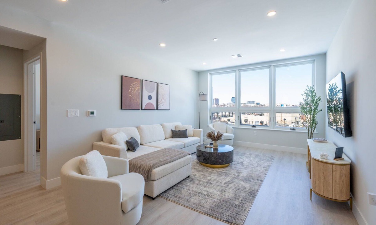 Historic Downtown Apartment | Luxe 2BR Retreat 5-Min PATH to NYC With Rooftop+Gym