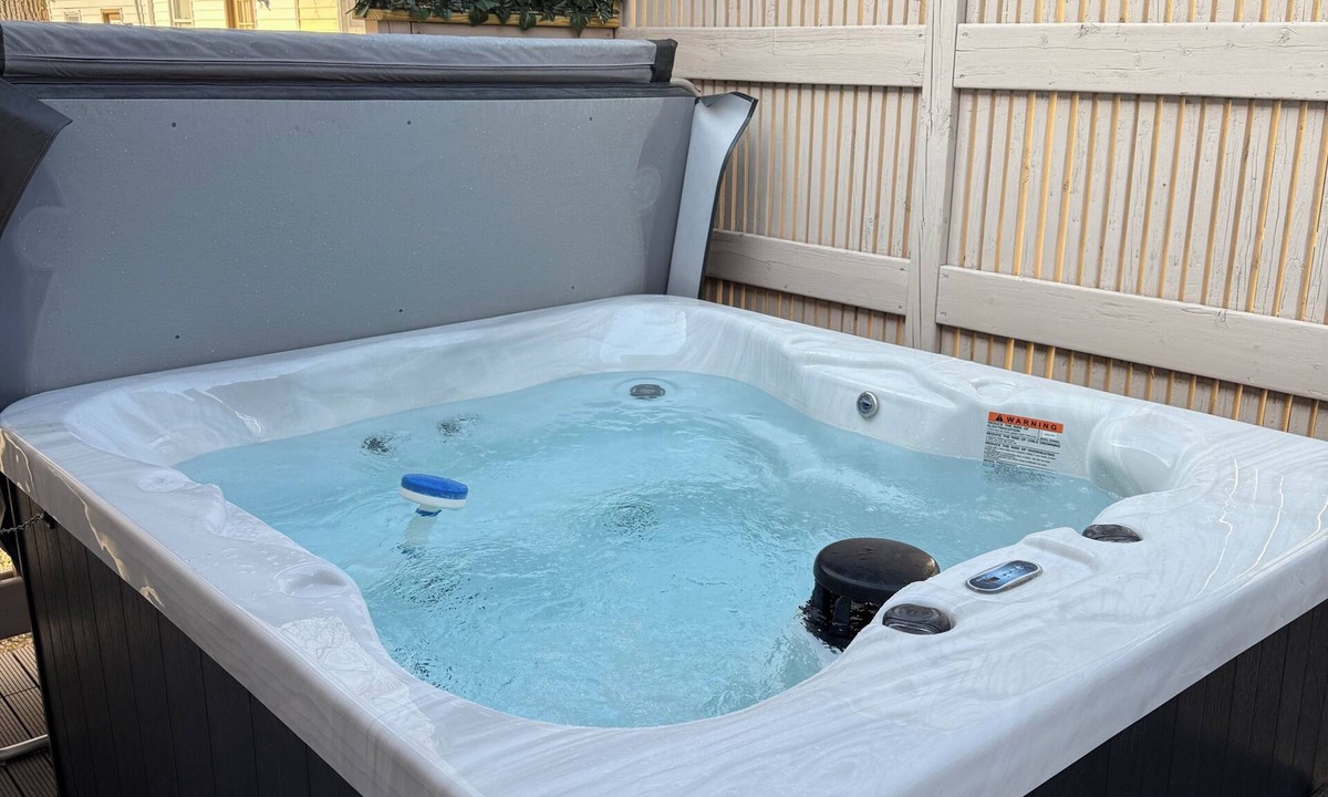 Dubuque House | Modern 2-bedroom home with 2 full bathrooms and hot tub!