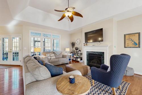 Livingston House | Peaceful lakeside retreat with hot tub, private pool, dock & paddle boards
