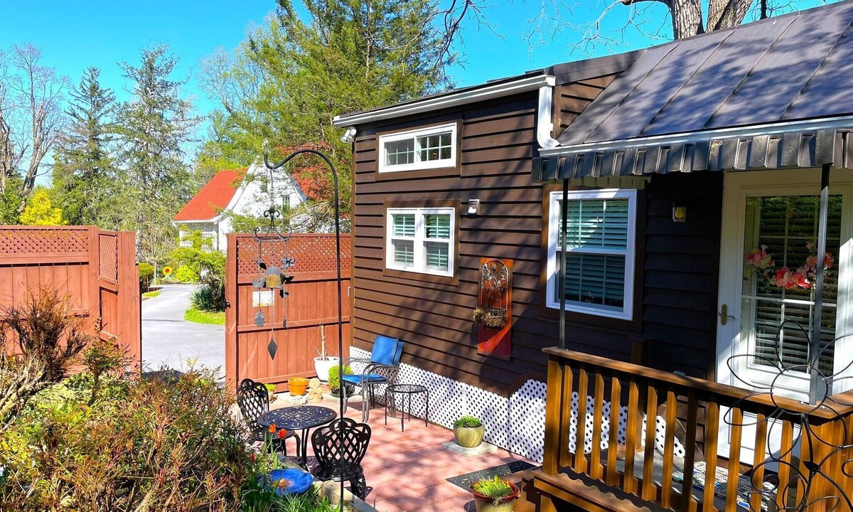 Winchester House | Peaceful Secret Gardens Tiny Home - loft & stairs lead to a Queen Size Bed