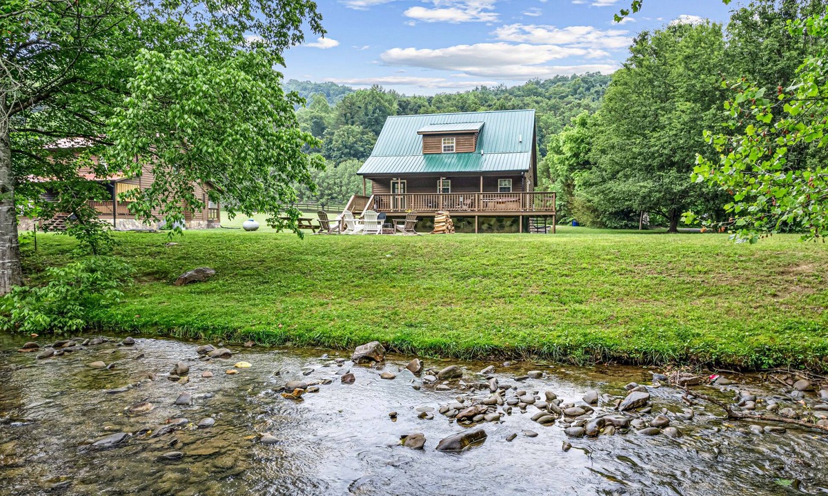 Cosby Cabin | Riverside Cabin w/Fishing, Hot Tub & Firepit