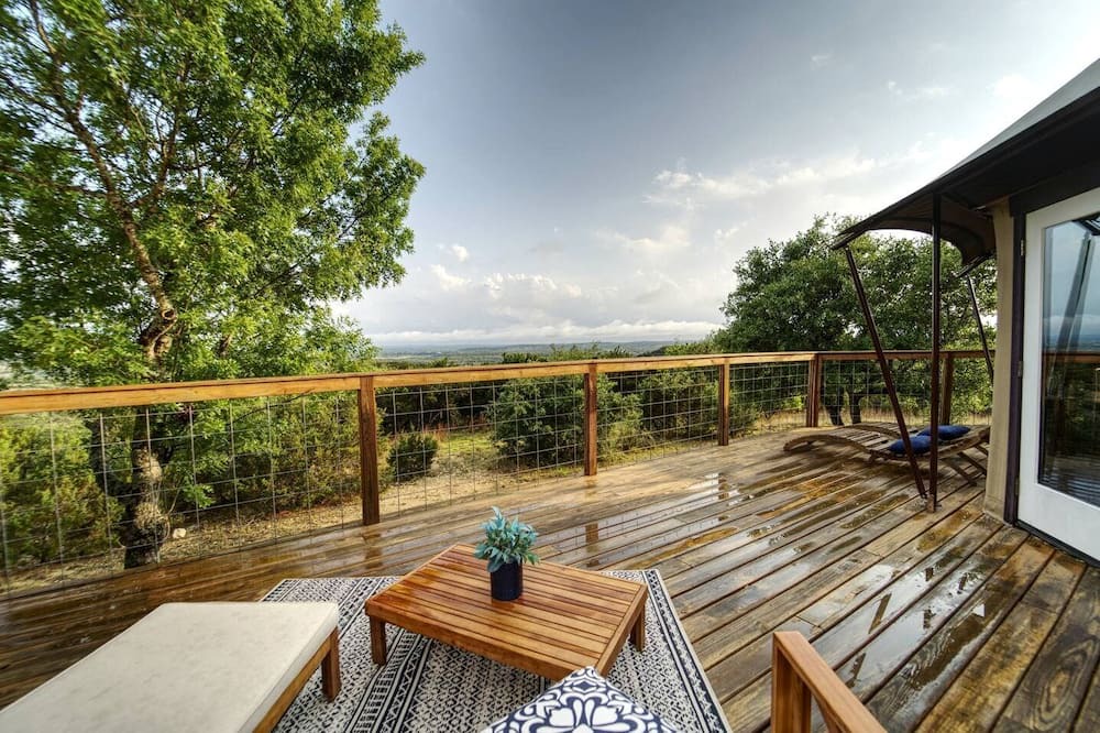 Oatmeal RV Rental | Romantic Hilltop Safari Glamping Tent with Lake Views near Lake Travis in Marble Falls, Texas