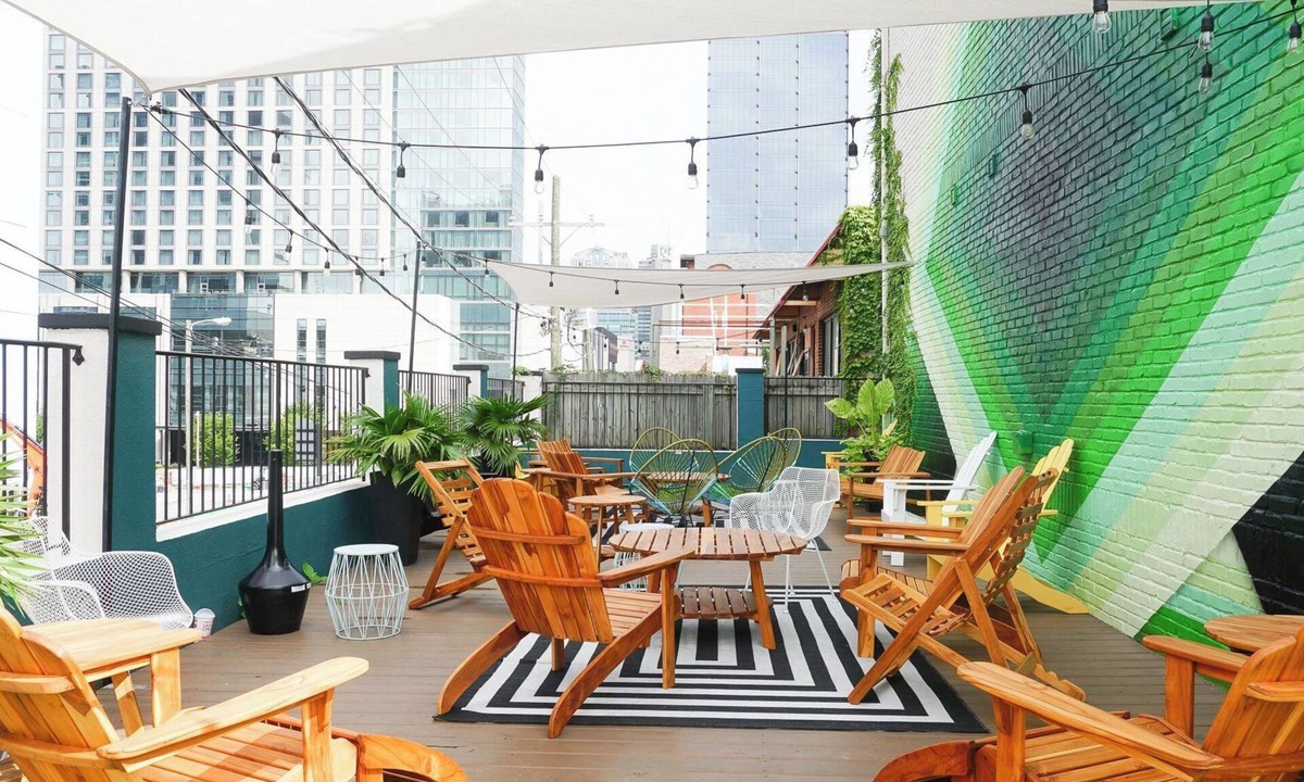 Sobro Cottage | Sleeps 8 4 Sobro Suites w/Kitchens & Art, Walk to Broadway by Avantstay