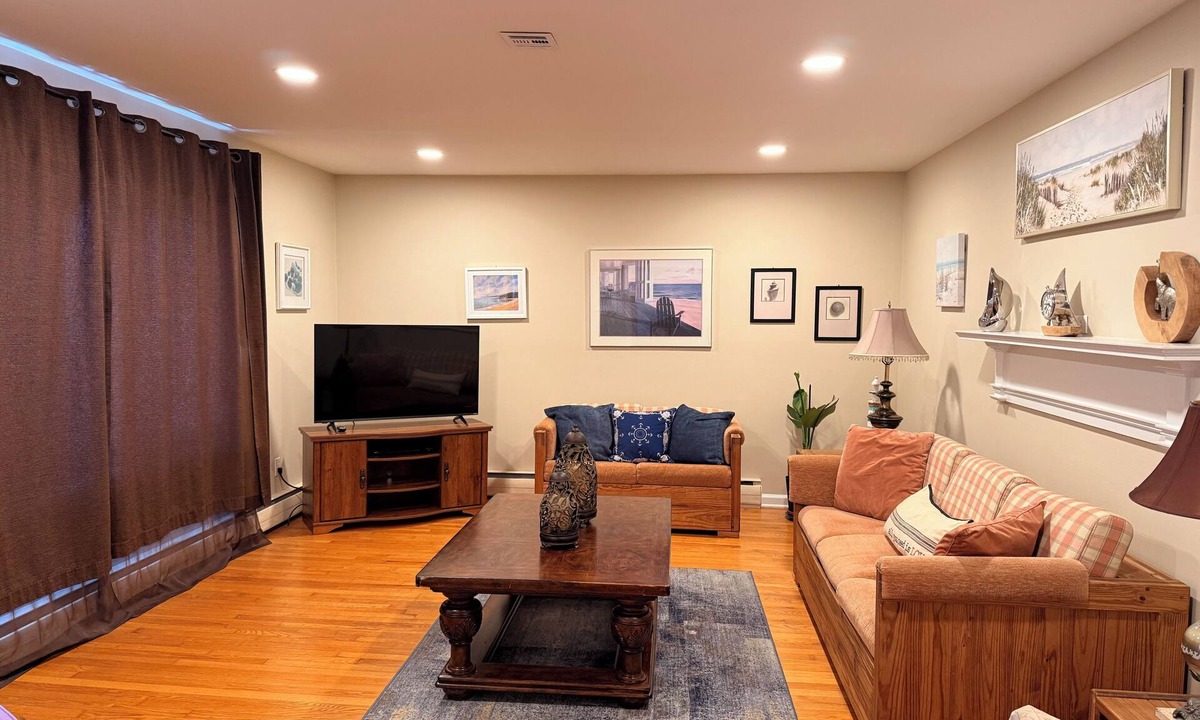 Belmar House | Spacious home with a view of the Shark River and a game room.