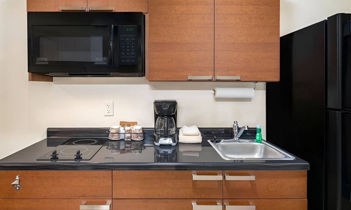 Council Bluffs Hotel | Stay Near Shops + Restaurants in Comfortable Studio w/Kitchen - Pet-Friendly