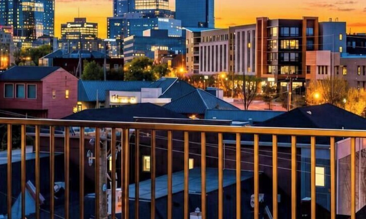 Rolling Mill Hill Apartment | Summer rooftop deck, skyline views, garage-door kitchen near Broadway
