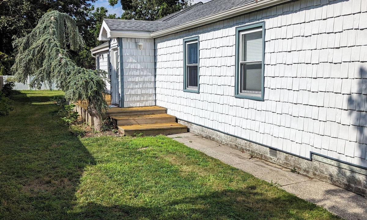 Somers Point House | Your family will be close to everything Steps to the Somers Point beach and nightlife.