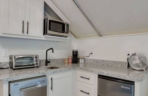 Groveoak RV Rental | #11 Love Shack Luxury Glamping Tent Lovers Theme