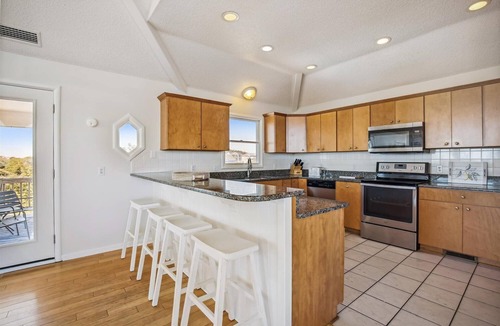 Whalehead Beach House | 1525 - Pampa Hill, 6-bed 5.5-bath Corolla NC private pool hot tub theater room game room sleeps 17