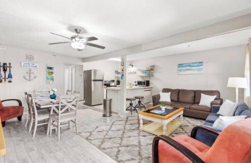 Caine Woods Condo | 2BR 2BA condo with parking, pool, walking distance to the beach & restaurants.