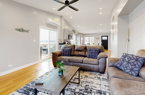 Channel Lake Apartment | 2nd-floor lakefront walk-up with firepit