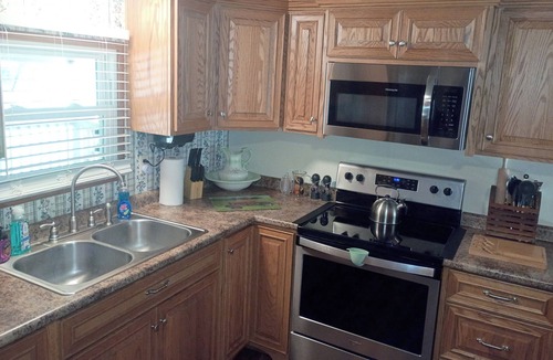 Matthews House | 3-Bedroom 2-bath Home – Covered Porch & Deck, Fenced front Yard, Carport, AC!”