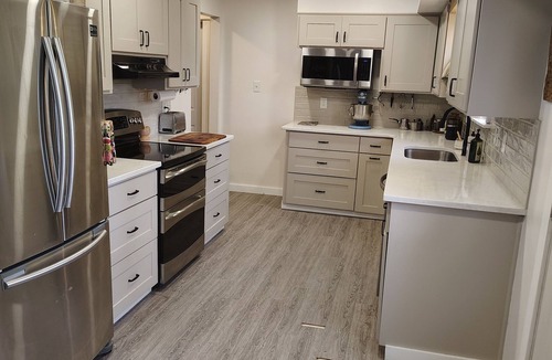 Martinez House | 3-bedroom house with back patio and screened in porch.