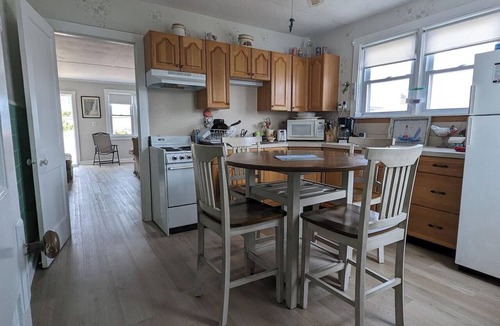 North Beach Haven Apartment | 3 cozy bedrooms, sleeping a total of 6 guests Partial water views of the beautiful bay Large deck and grassy yard for outdoor enjoyment