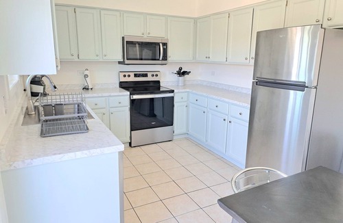 Roselle Apartment | 32+ Night Stay 2BR Condo Walk to Train