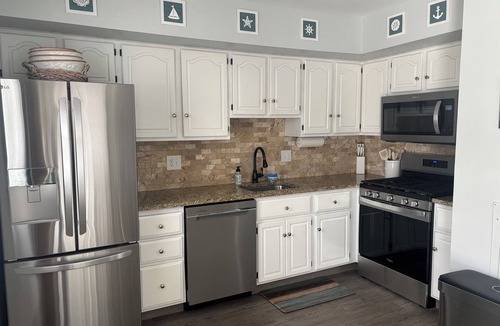 Townsend's Inlet Condo | 4-bedroom Beach Block Condo in Townsend Inlet! Perfect location! Ample parking!