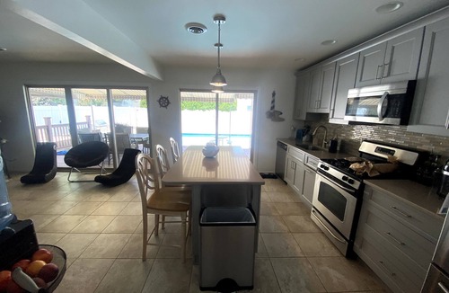 Avon House | 4 Bedroom, 3 Bath with Heated Pool + Hot Tub short walk to beach