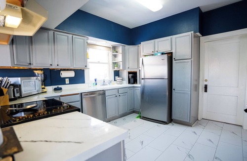 East Campus House | 4BR UNL East Campus Historic Home | Sleeps 8 | 3–4 Parking | Pergola + Porch