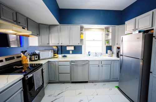 East Campus House | 4BR UNL East Campus Historic Home | Sleeps 8 | 3–4 Parking | Pergola + Porch