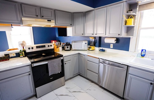 East Campus House | 4BR UNL East Campus Historic Home | Sleeps 8 | 3–4 Parking | Pergola + Porch