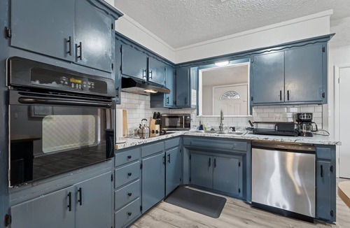 Central Oklahoma City House | 5BR Bethany home near SNU & Wiley Post. Fenced yard, full kitchen. Sleeps 10. #NW25
