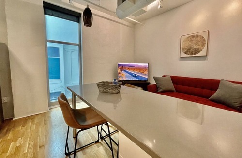Old Market Apartment | A historic 700 square foot Atrium loft in the heart of the Old Market