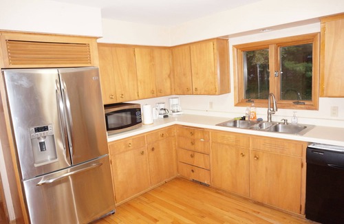 Urbandale House | Acreage InTown 4 BR, 2 Bath 3,300 sq ft half house option with gymnasium.