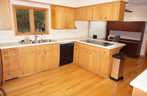 Urbandale House | Acreage InTown 4 BR, 2 Bath 3,300 sq ft half house option with gymnasium.