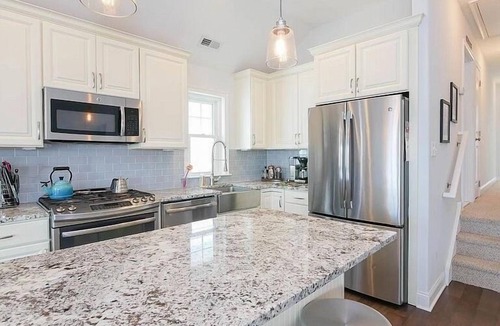 North End Condo | AMAZING 2nd floor unit, great downtown location! Walk to all the shops and restaurants on Asbury Ave. Steps to the Farmer's Market, bike anywhere! Relax on the beautiful 2nd floor deck with your morning coffee or evening cocktail.