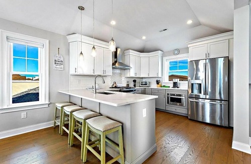 Beach Haven Crest House | Bay and Beach Views Sunsets! Elevator, Heated Saltwater Pool open May 23, 2026.