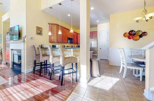 The Commons House | Bayside Resort home with decks, gas fireplace, bikes, ping-pong table, W/D, & AC