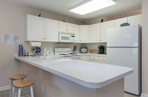 Heron Harbour Isle Condo | Baywatch I - 201B