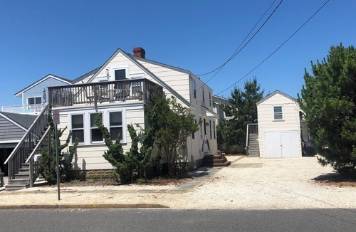 Peahala Park House | Beach-block Bungalow at LBI: Classic wood-paneled Cape Cod, 100 yards from beach