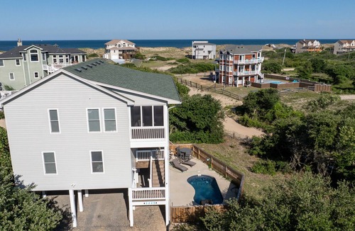 Carova Beach House | Beautiful Carova beach house with ocean view, pool and hot tub! Pet Friendly!