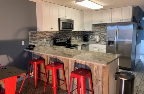 North Ocean City Condo | BEAUTIFUL & CLEAN! Waterfront condo with epic sunsets and a POOL!