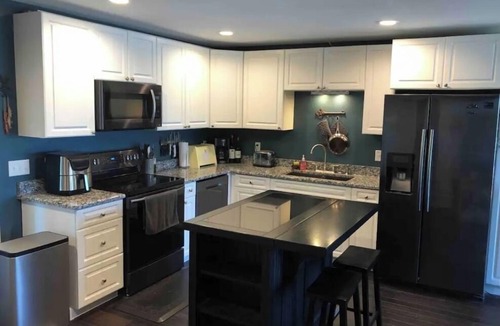 Maple Lake House | Beautiful deck overlooking Maple Lake with private, shared dock.