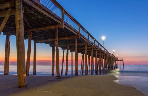 Midtown Ocean City Condo | Beautiful, Sunlit Home in Beachfront Building w/Central AC, Balcony, Free WiFi