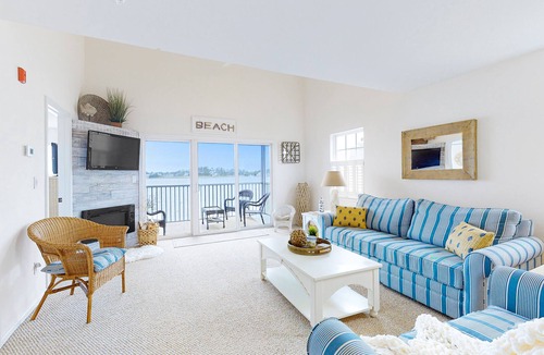 Ocean View Condo | Bethany Bay Condo Overlooking Water with Shared Pool, Private W/D, & WiFi