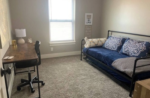 Bettendorf Condo | Bettendorf Condo: Fireplace, King Bed & Family Fun!
