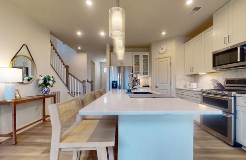 Millville Villa | Bishop's Landing new villa with EVC, fireplace, outdoor pool, gym, and tennis