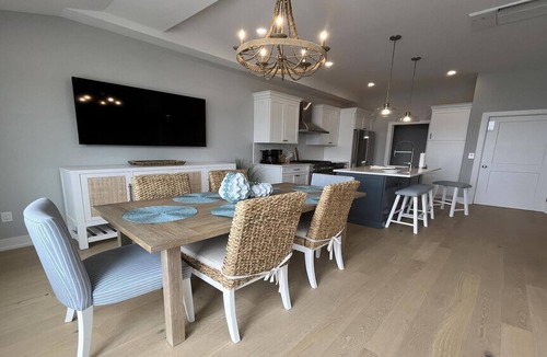 North Beach Haven Condo | Brand new Bayfront Luxury Townhome with Pool and Elevator.